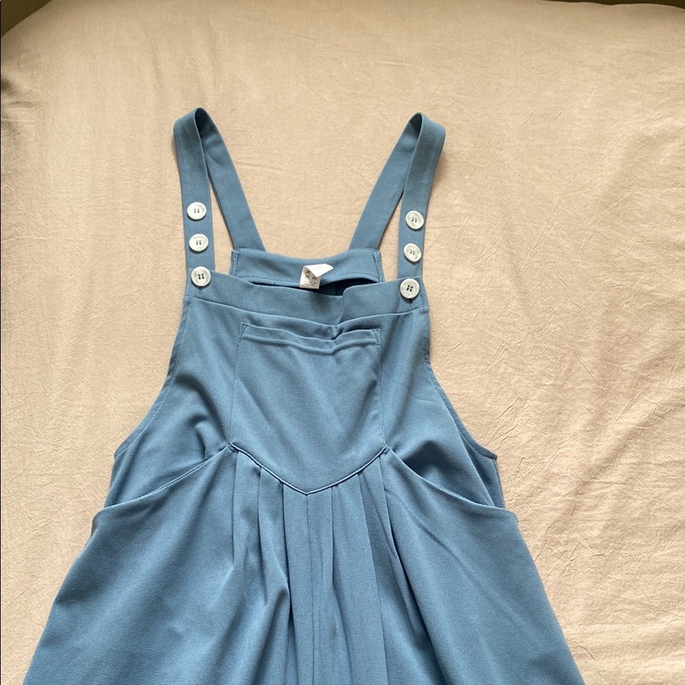 Blue Buttoned jumpsuit from Harla. Size M. In good condition.